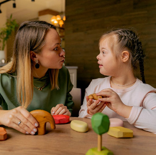 special-education girl with teacher